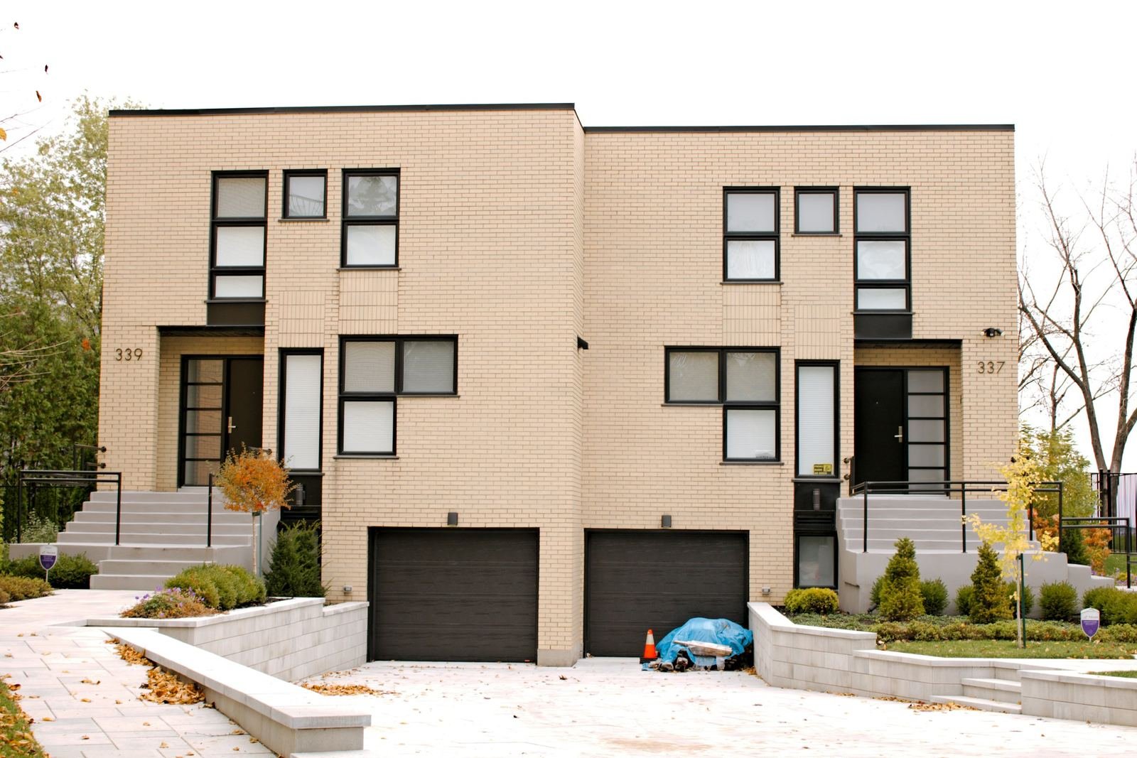Two-storey modular duplex with garages